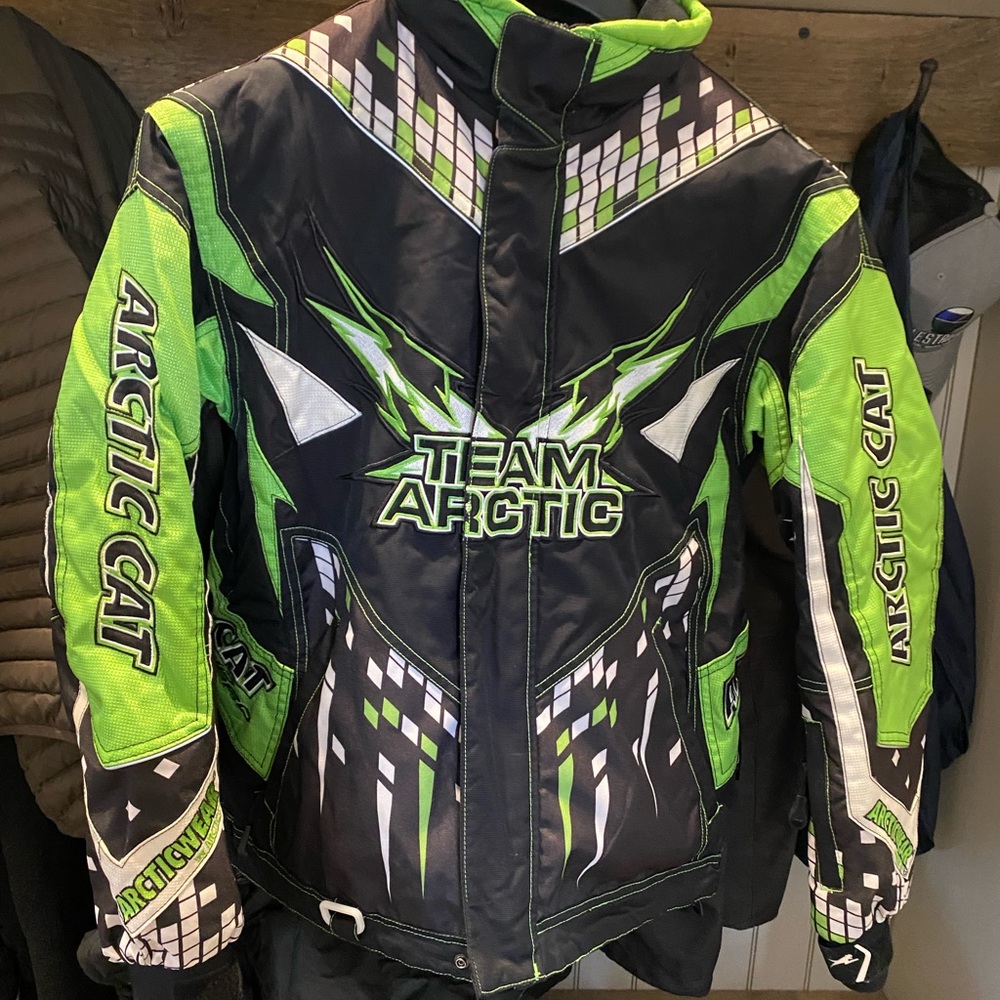 Hardly used Team Arctic Cat Women's small snowmobile jacket.